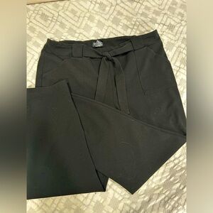 Black capri slacks with tie waist band. Size L.